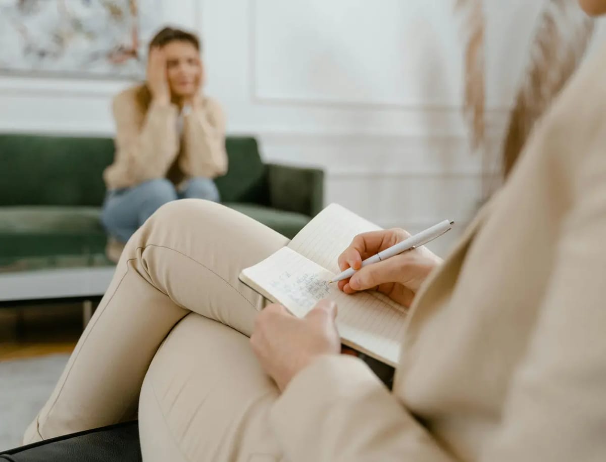 A person in a conversation with a therapist